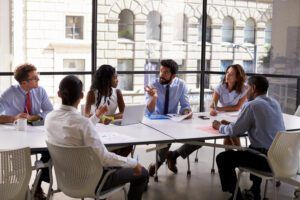 A business meeting with the leader making a point.